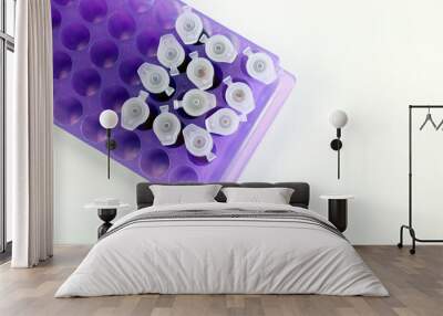 Micro Centrifuge tube with blood sample in solution, for testing anti-biotic with tips micropipette and purple eppendorf racks isolated in white background, biotechnology experiment for anti-virus.	 Wall mural