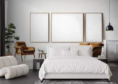 Two armchairs in room with white wall and big frame poster on it Wall mural