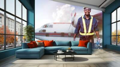 African engineer technician maintenance man checking and fixing the engine of the airplane with use tools and wrench Wall mural