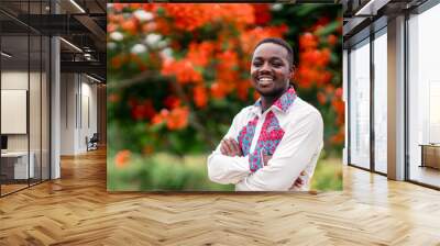 Portrait of african man wearing native cloth traditional colorful with smile and happy. Wall mural