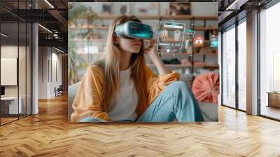 A young woman explores posibities of her new spatial VR headset, interacting with a digital augmented reality interface in a modern living room. Wall mural