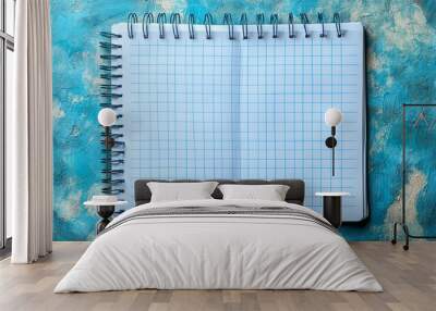 an Lined paper background with a white notebook sheet and blue grid, ideal for educational or creative projects. Wall mural