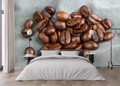 Coffee beans on fabric background Wall mural