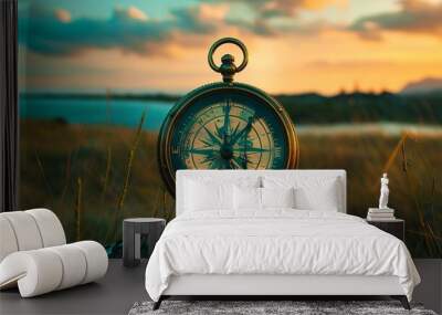 Vintage Compass on Rock: Symbol of Navigation at Sunset Wall mural