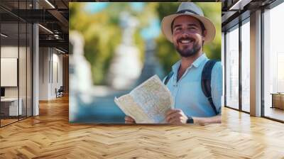 Tour guide holding a map, standing with a smile, blurred historic site in the background. Wall mural