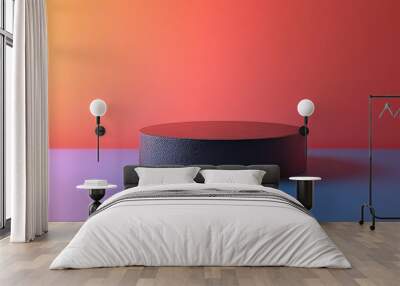 A black and grey object is sitting on a blue and orange background Wall mural