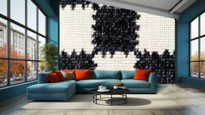 A black and white checkered blanket with white squares Wall mural