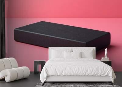 A black square with a pink background Wall mural