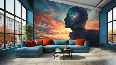 A man's head is shown in the sky with a bright light in the center Wall mural