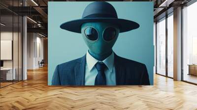 A man in a suit and hat with a green alien mask on his face Wall mural