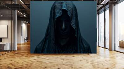 A person is wearing a hooded cloak and has their face obscured Wall mural