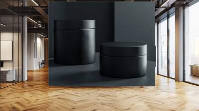 Two black containers sit on a table Wall mural