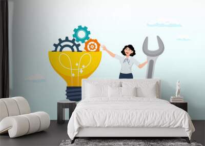 Innovation or product development, idea or solution to solve business problem, invention or technology creation to build new product, efficiency concept, businesswoman build gear in lightbulb idea Wall mural