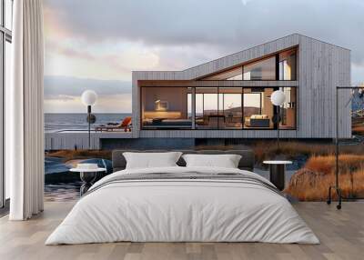 a modern, minimalist beach house surrounded by sand dunes and tall, windswept grasses. The house features large glass windows that allow for an unobstructed view of the beach and ocean Wall mural