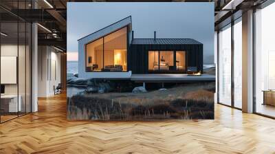 a modern, minimalist beach house surrounded by sand dunes and tall, windswept grasses. The house features large glass windows that allow for an unobstructed view of the beach and ocean Wall mural