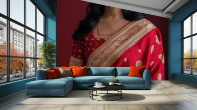 Portrait of Indian woman in rich red saree with gold accents, standing gracefully with hands clasped, with a red to burgundy gradient glowing backdrop, Indian traditional Diwali festival, Diwali  Wall mural