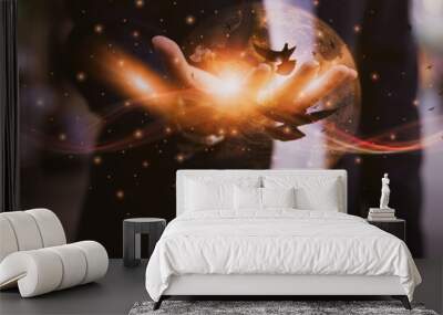 businessman contemplation and raise hands touching world, praying free bird for god's blessings, min Wall mural