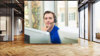 Handsome man smile in office,call center service,customer operator helpline service center,staff support sale with headset,call center telephone telemarketing sales agent,information service assistant Wall mural