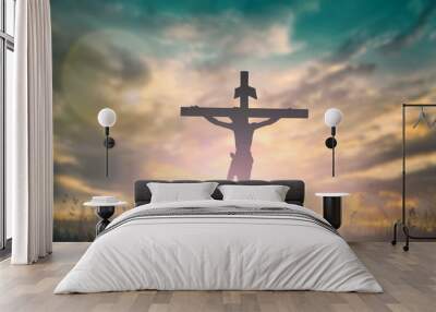 silhouette of jesus with cross over rainbow sunset concept for religion, worship, christmas, good fr Wall mural