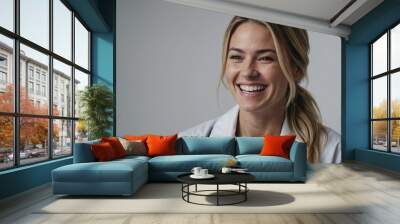 Young female doctor on isolated background, space for text, studio shot, professional shooting Wall mural