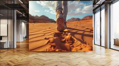 Someone is walking in the middle of the desert. Wall mural