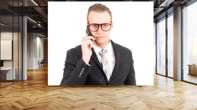 Businessman in elegant black suit using smartphone isolated on white background Wall mural