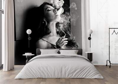 Fashion portrait of  beautiful woman sexy slim body smoking cigarette Wall mural