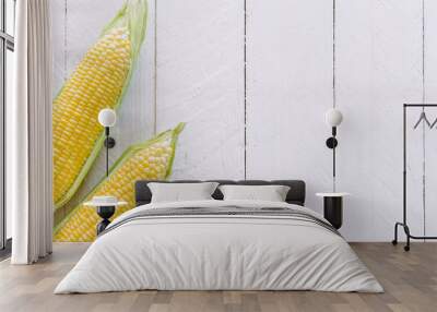 Fresh  yellow sweet corn on wooden table Wall mural