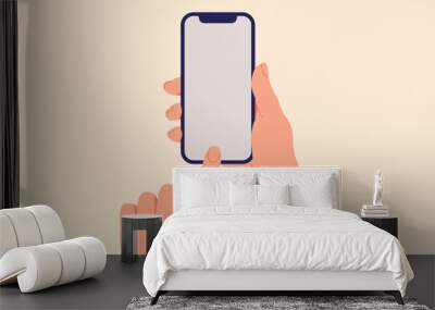 Hand holds smartphone. Hand with smartphone Wall mural