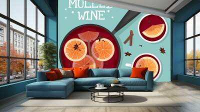 Red mulled wine in a pot with orange slices, cinnamon, cloves and a bucket. Two white mugs of mulled wine. Flat lay Wall mural