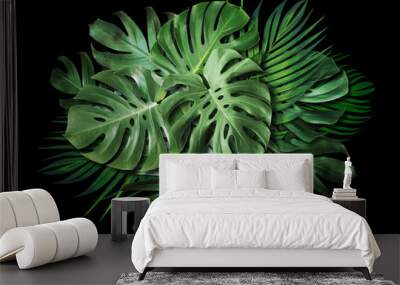 Tropical leaves on black background with copy space Summer banner design Wall mural