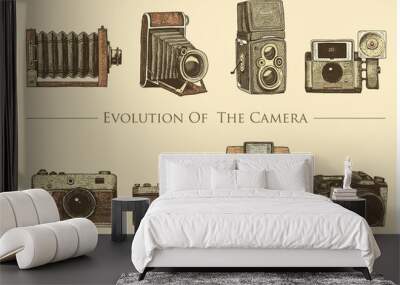 evolution of the photo, video, film, movie camera from first till now vintage, engraved hand drawn in sketch or wood cut style, old looking retro lens, isolated vector realistic illustration Wall mural