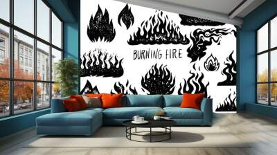 set of flame and fire in vintage style. hand drawn engraved monochrome bonfire sketch. vector illust Wall mural