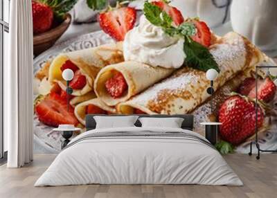 Crepes with strawberries and cream on white background Wall mural