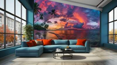 A vibrant sunset over a tropical beach with palm trees and colorful clouds. Wall mural