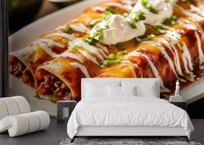 Delicious plate of enchiladas topped with sour cream and green onions. Wall mural