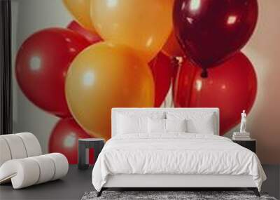 Colorful balloons floating gracefully in a bright indoor space during a festive celebration Wall mural