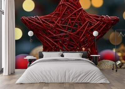 Decorative red star surrounded by colorful ornaments on a wooden table during festive season Wall mural