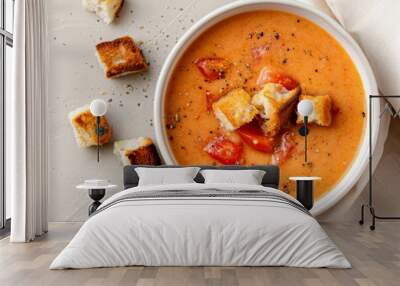 Fresh Tomato Soup Topped With Croutons and Basil on a Sunlit Table Wall mural