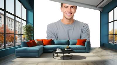 Portrait of handsome smiling young man with folded arms isolated Wall mural