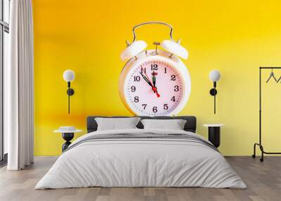 alarm clock on a color background Wall mural