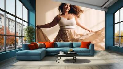 Authentic Plus Size model is dancing. Natural in her movements in this activity, enjoying the process Wall mural