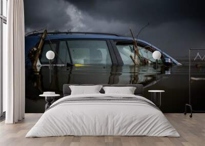 Flooded vehicle in stormy weather reflecting nature's power and destruction Wall mural