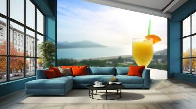 Fresh juice cocktail on the beach. Vacation background. Ai generated Wall mural