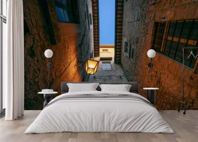 Narrow steet in the historic center of Spoleto in the province of Perugia, Umbria, Italy Wall mural