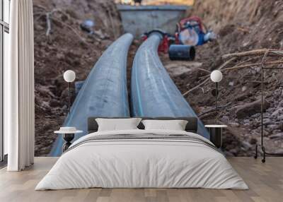 sewer pipes with water are laid underground Wall mural