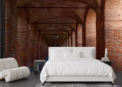 Red brick columns and arches in Galleria degli Antichi in Sabbioneta town. Lombardy, Italy Wall mural