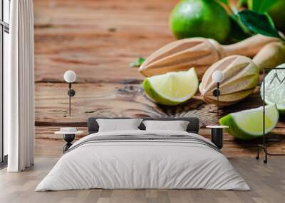 Fresh limes. On wooden table. Wall mural