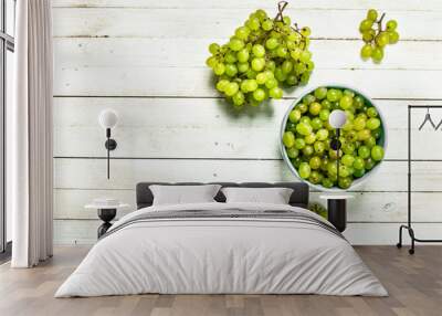 Green grapes in a bowl. Wall mural