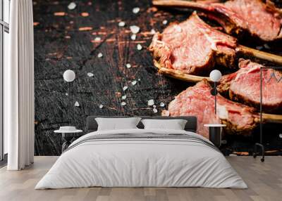 Rack grilled lamb with salt on the table.  Wall mural